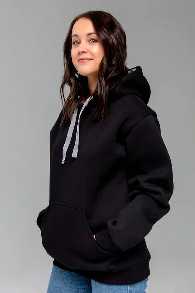 Woman in black hoodie, mockup for logo or branding design