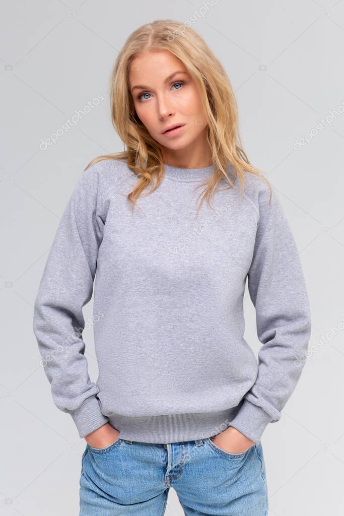 Blank sweatshirt mock up isolated. Female wear plain hoodie mockup. Plain hoody design presentation. Clear loose overall model. Pullover for print. Woman clothes sweat shirt template sweater wearing