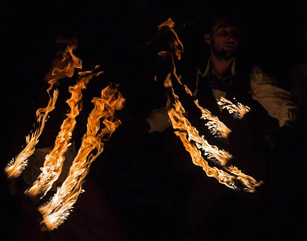 Man in fire show — Stock Photo, Image