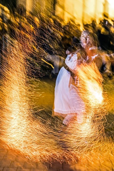 Woman in fire show — Stock Photo, Image