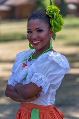 Young dancer girl from Puerto Rico in traditional costume clipart
