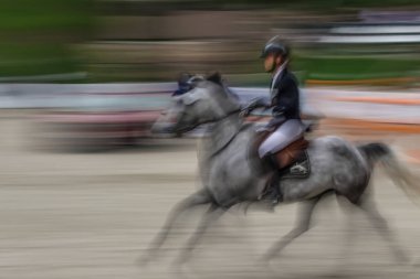 Hareketli binici ve at atlama, soyut resimle