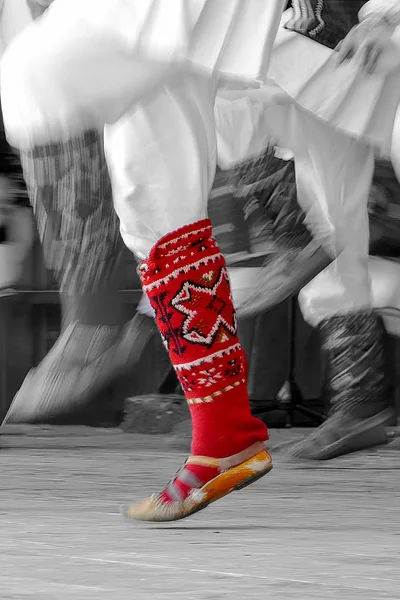 Bulgarian dancers legs in a traditional dance — Stock Photo, Image