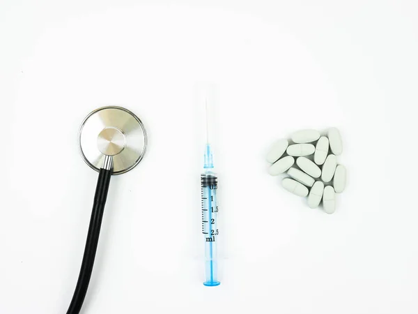 Plastic Syringe Pills Stethoscope White Background — Stock Photo, Image