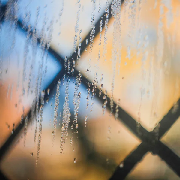 colored glass drops in the morning