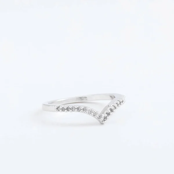 Luxurious silver jewelry ring with transparent crystals, rhinestones drops, on a grey background — Stock Photo, Image