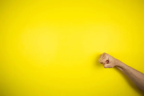 Punch Knock Hand Gesture Yellow Background — Stock Photo, Image