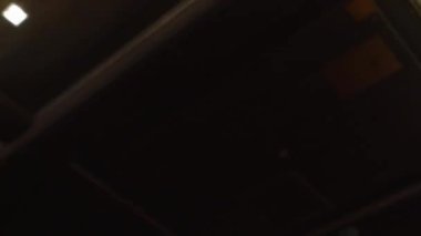 Blue game chip flies on a black background