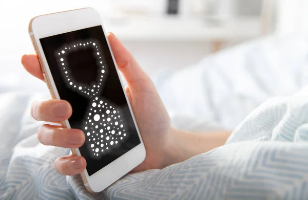 Hourglass clock app on smart phone, sleeping time