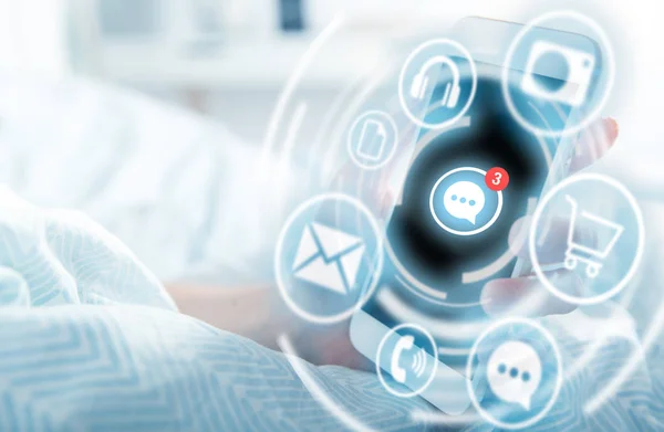 Smartphone with message app and cloud of apps in woman hand — Stock Photo, Image