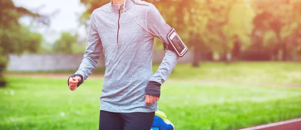 Outdoor Sport Exercises, Sporty Outfit Ideas. Woman Wearing Warm Sportswear  Getting Ready Before Exercising, Running Jogging Outside During Winter.  Stock Photo, Picture and Royalty Free Image. Image 87208141.
