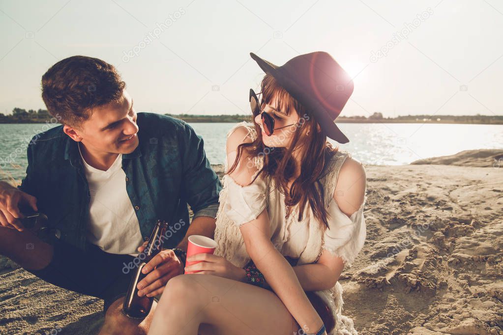 Happy couple outdoor, fashion styled friends have fun