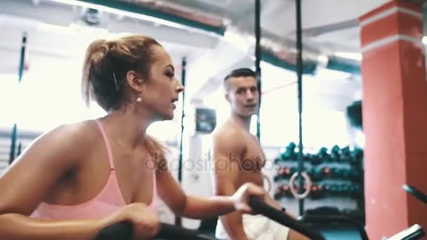 Fitness Couple Cycling Machines Doing Exercise Modern Gym — Stock Video