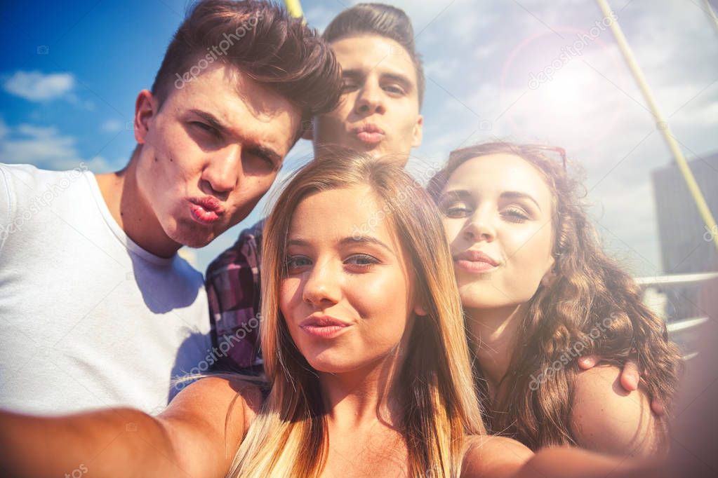 Selfie of group of teenage friends outdoor