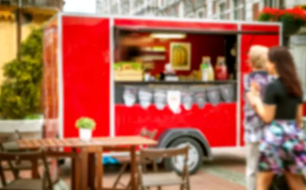 Food truck festival blurred image for background — Stock Photo, Image