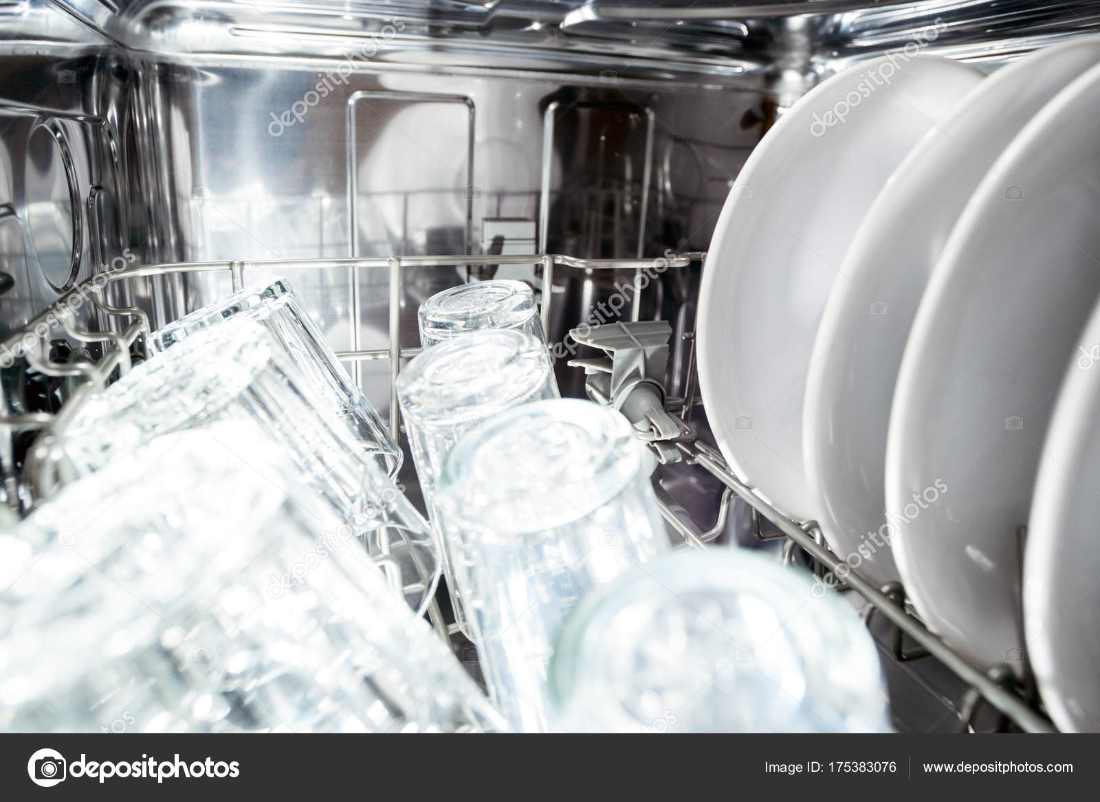 Interior Of Dishwasher Machine With Clean Dishes Stock
