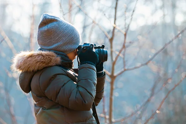 Boy using digital camera taking photo in the nature, hobby concept — Stock Photo, Image