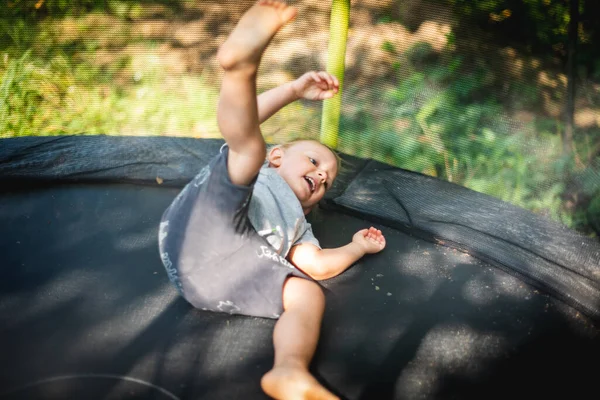 Little Child Playing Jumping Trampoline Outdoor Backyard — Stock Photo, Image