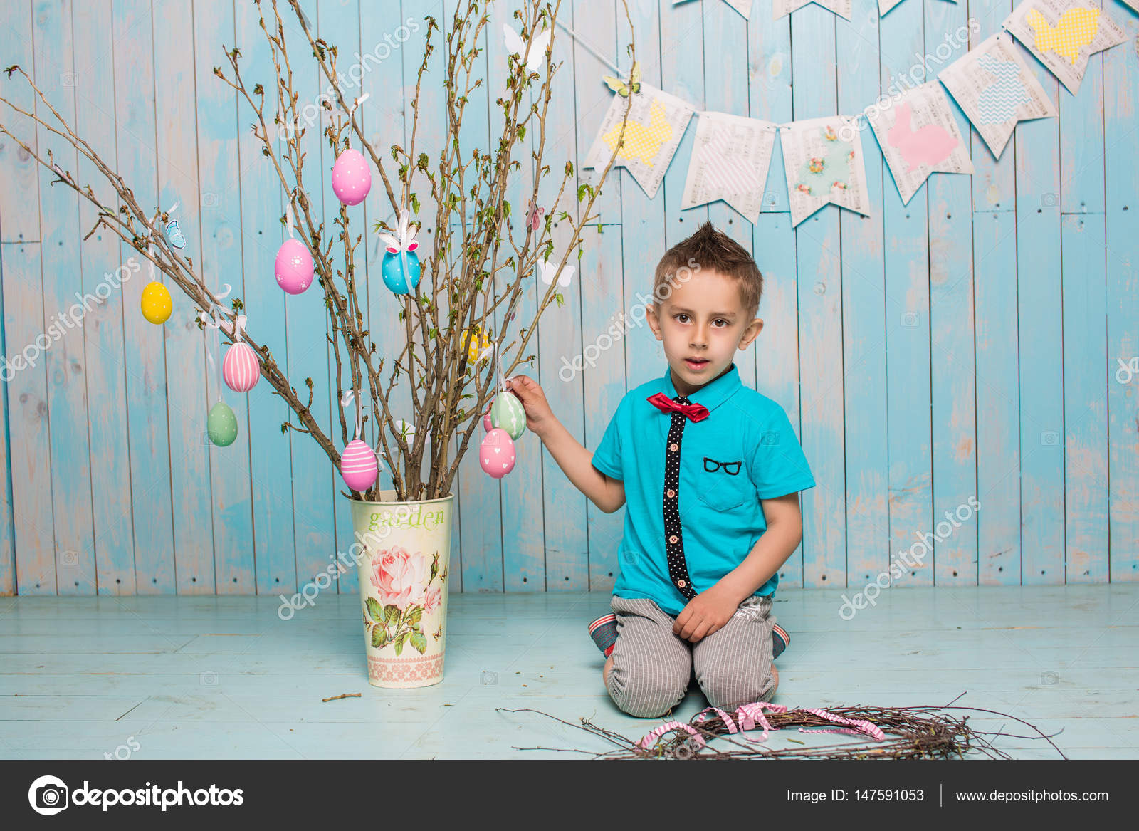 Little Boy Brother Along With Rabbit Sitting On The Floor Or Chair