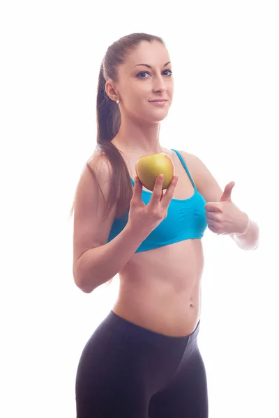 Joven en forma mujer ofrece manzana — Foto de Stock