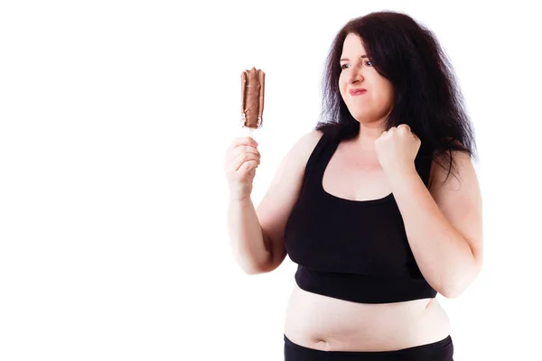 Young overweight food addicted woman struggling with herself, ke — Stock Photo, Image