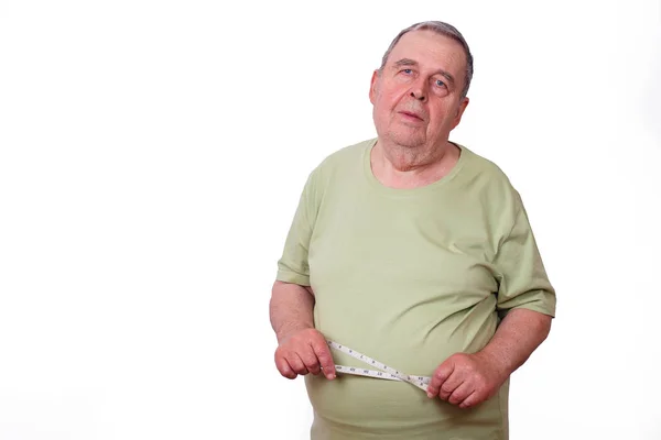 Portrait of senior elderly overweight man with measuring tape ar — Stock Photo, Image