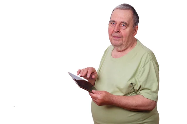 Portrait of senior man pensioner using tablet, typing message, i — Stock Photo, Image