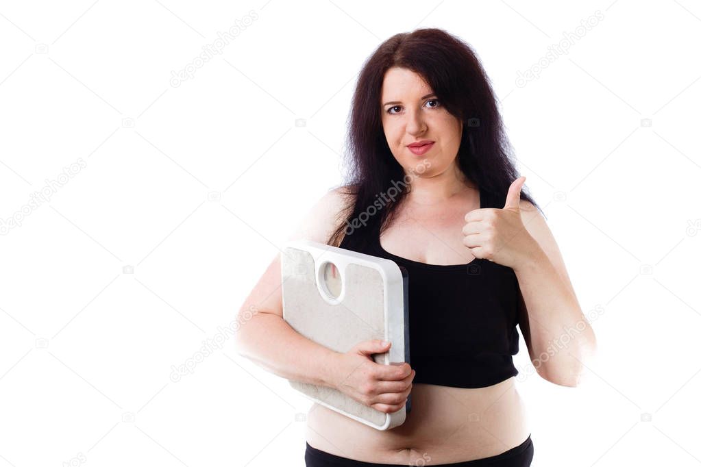 Young overweight woman agitating for healthy lifestyle with scal