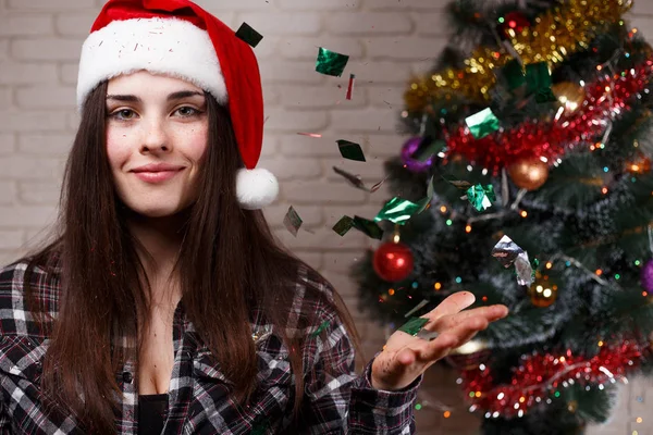 Young beautiful woman in Santa cap welcoming the new year 2018 t — Stock Photo, Image