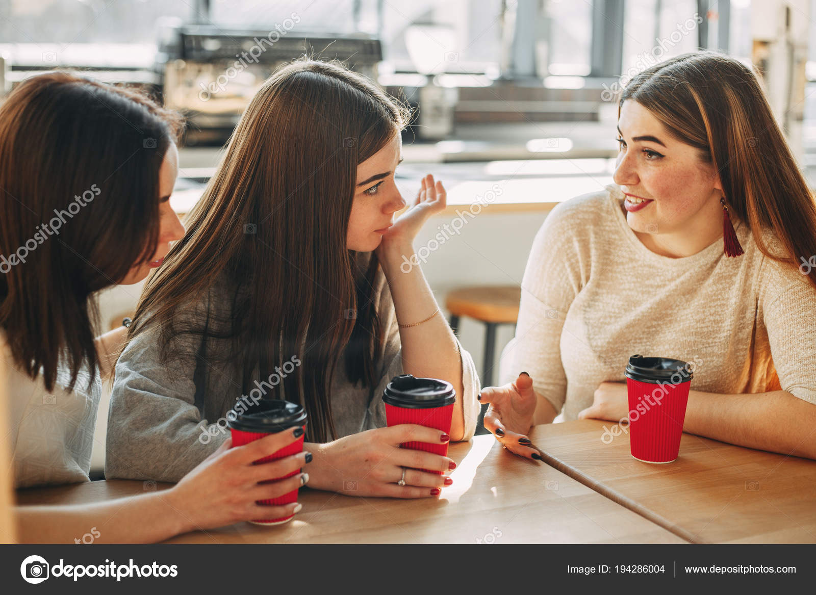 Girl Trying To Comfort To Her Sad Best Friend Stock Photo