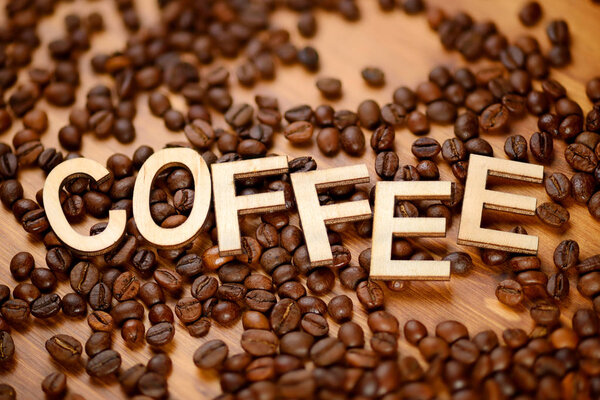 Coffee word with beans