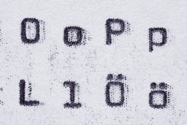 Real typewriter font alphabet with letters O, P, L