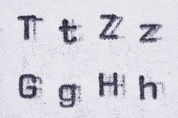 Real typewriter font alphabet with letters T, Z, G, H — ストック写真