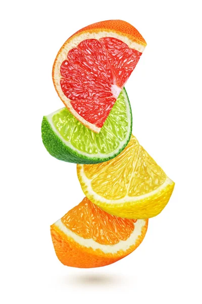 Slices of citrus fruits isolated on white background — Stock Photo, Image