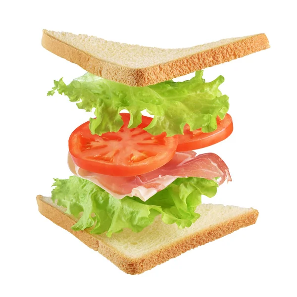 Sandwich mit fliegenden Zutaten isoliert auf weiß — Stockfoto