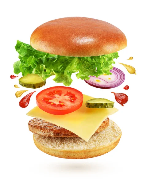 Voando Burger isolado no fundo branco — Fotografia de Stock