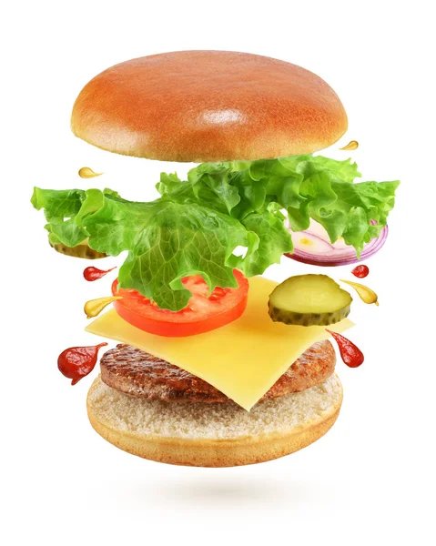 Voando Burger isolado no fundo branco — Fotografia de Stock