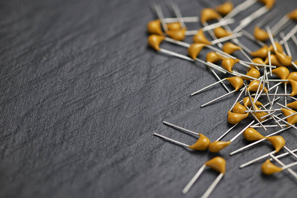 Heap of yellow multilayer ceramic capacitors