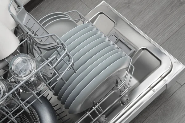 Opened domestic dishwasher with cleaned dishware — Stock Photo, Image