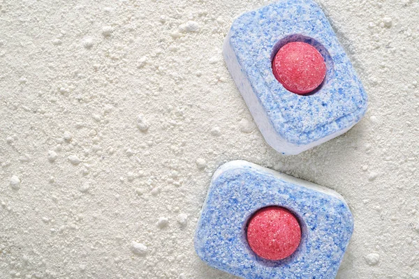 Dishwasher detergent tablets and powder