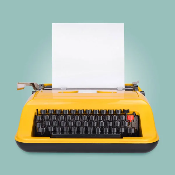 Gele Schrijfmachine Met Kopieerruimte Lege Plek Voor Tekst Blauwe Achtergrond — Stockfoto