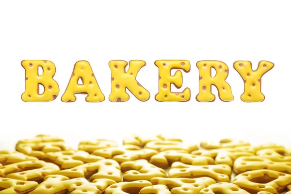 Bäckerwort Aus Gelbem Selbstgebackenem Lebkuchen Isoliert Auf Weißem Hintergrund — Stockfoto