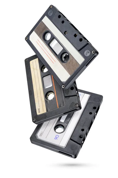 Drie Zwarte Audio Tape Compacte Cassettes Geïsoleerd Witte Achtergrond — Stockfoto