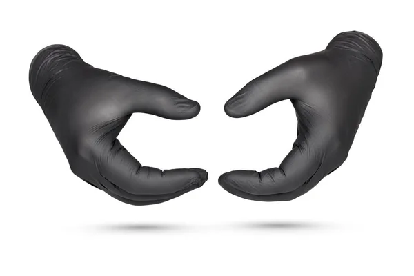 白い背景に隔離された黒いナイトリル保護手袋で何かを保持または示す手 — ストック写真