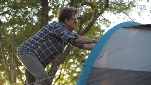 Summer Vacation in a Tent. Retired Caucasian Woman in Her 60s — 비디오