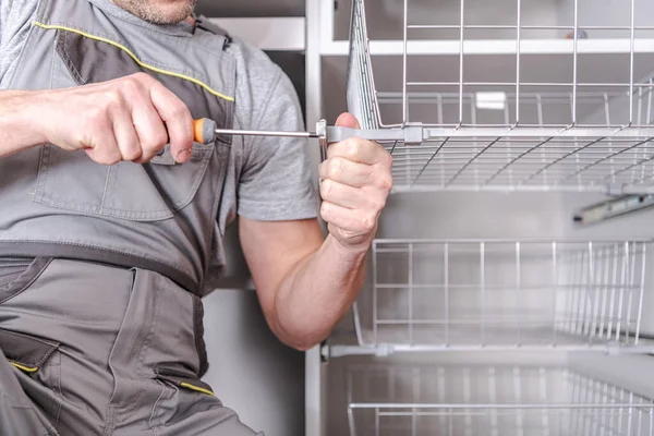Male Home Owner Using Screwdriver Tighten Metal Baskets Closet — Stock Photo, Image