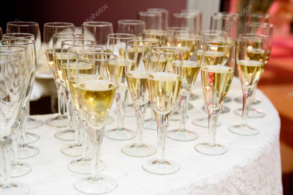 Arrangement of glasses with champagne.
