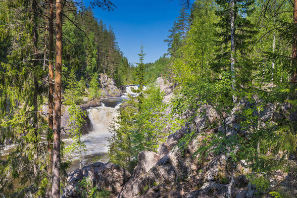 View from the forest to the waterfall Kicach