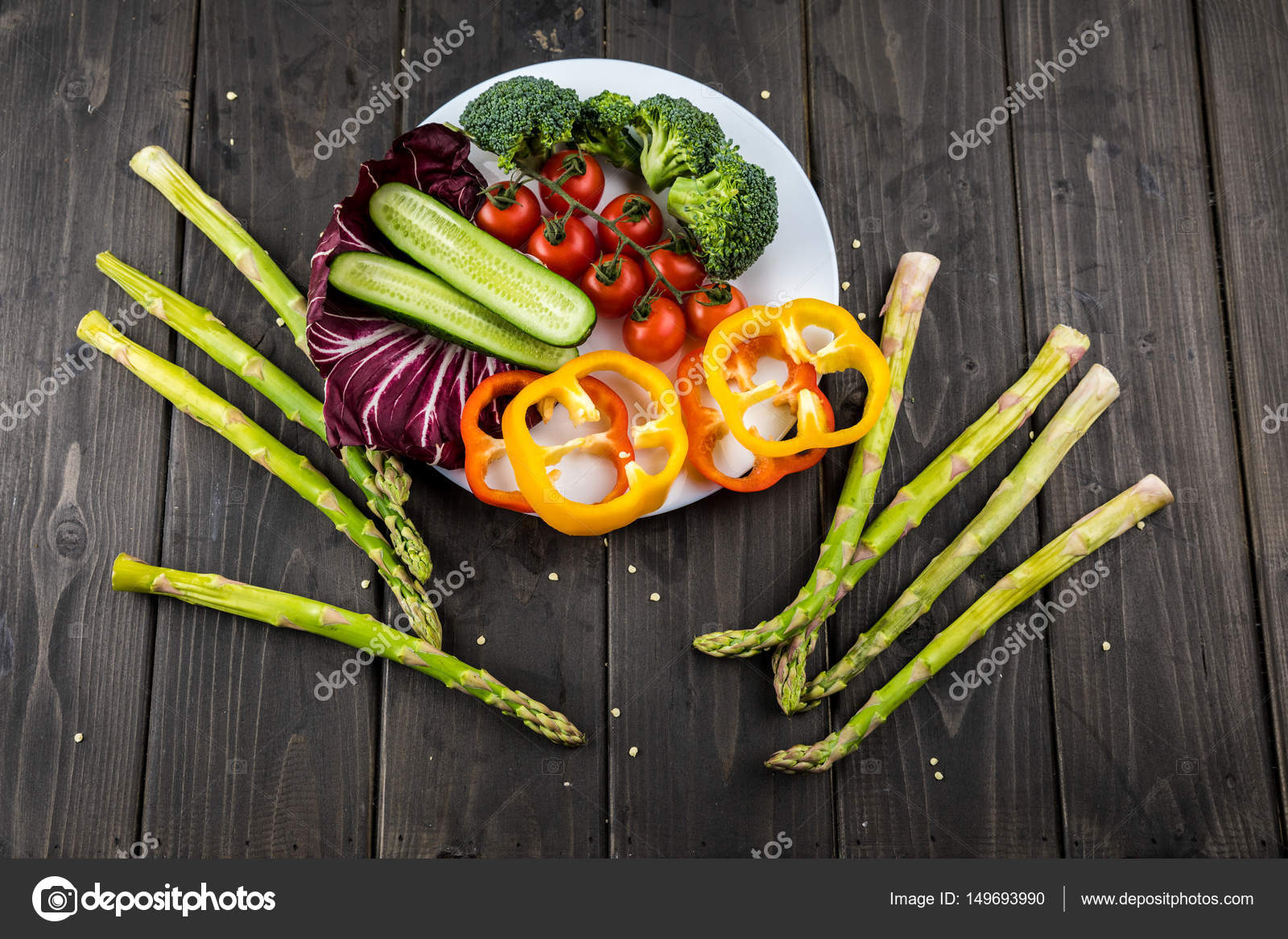 Fresh vegetables on plate — Stock Photo © VikaKhalabuzar 149693990