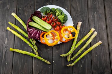 Fresh vegetables on plate  clipart